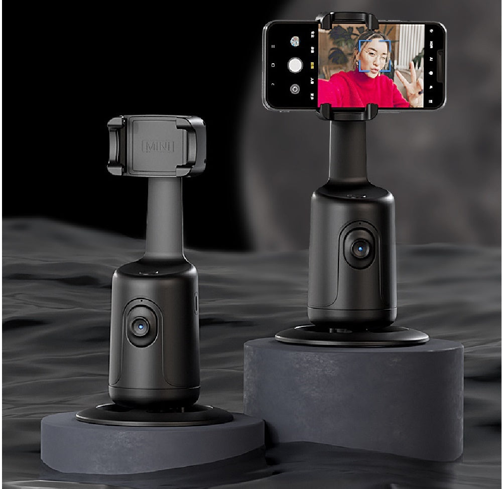 0Phone Holder Stabilizer TripodFEATURES:


360° Rotation: Capture stunning shots from every angle with the ability to rotate 360° without any dead angles. Whether you're shooting landscapes or porPhone Holder Stabilizer